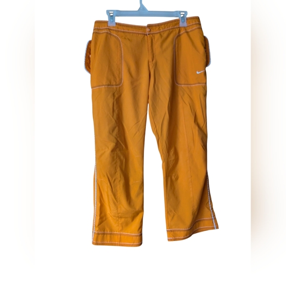 Nike Womens Capri Athletic Pants Orange Pockets Stitching Detail Sz L - Picture 1 of 14